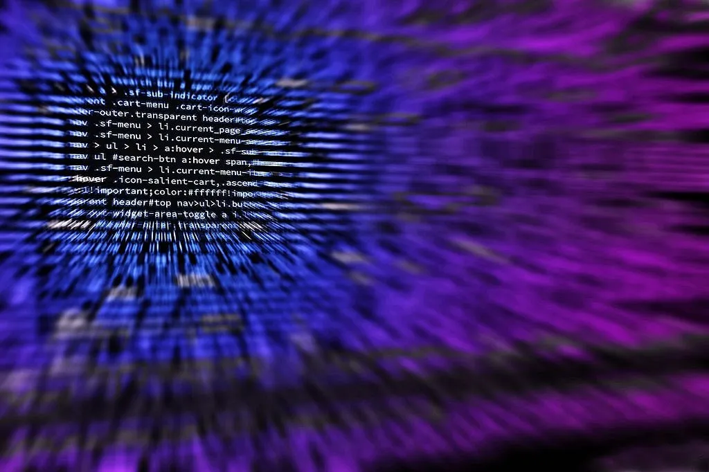 Laptop with code on screen
